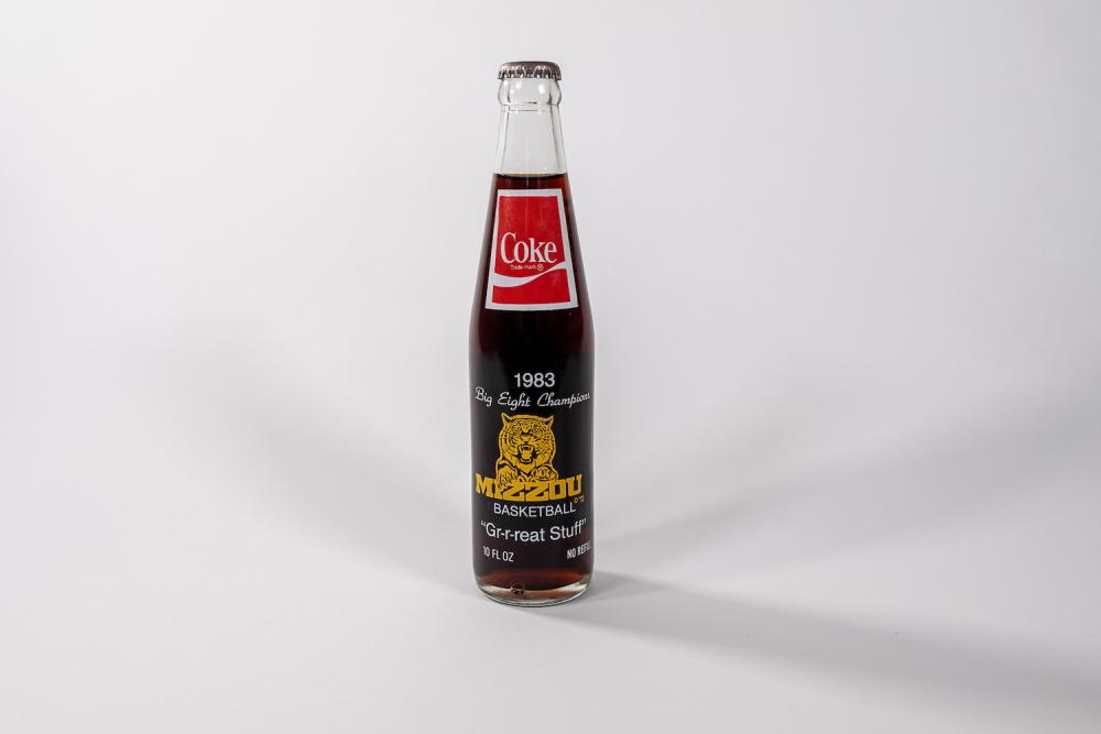 A collectible Coca-Cola bottle 