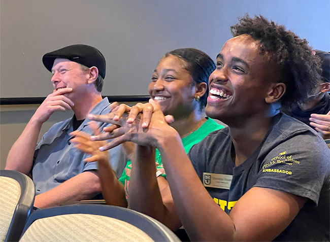 Chris Josey and two of the students who nominated him