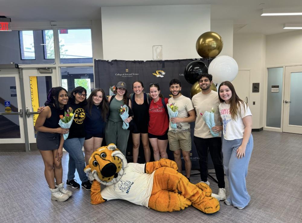 A&S photo of students and Truman the tiger