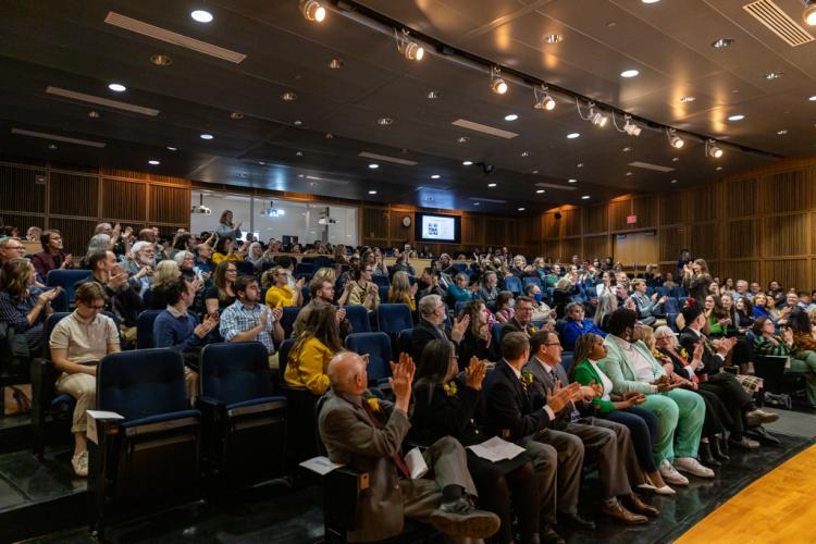 audience seated in auditorium 
