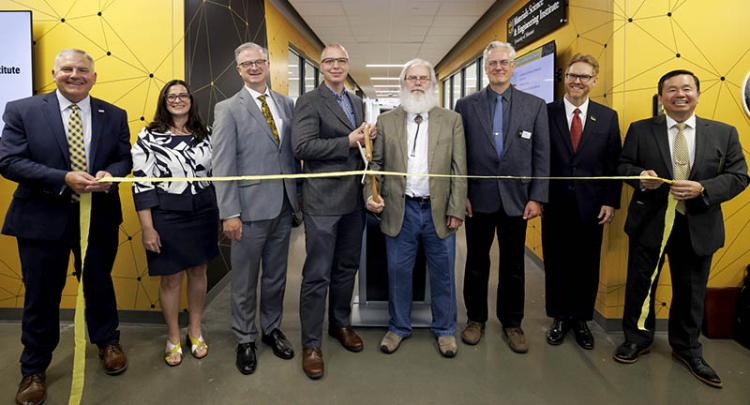 University and College leaders celebrating the grand opening of the MU Materials Science & Engineering Institute (MUMSEI) 