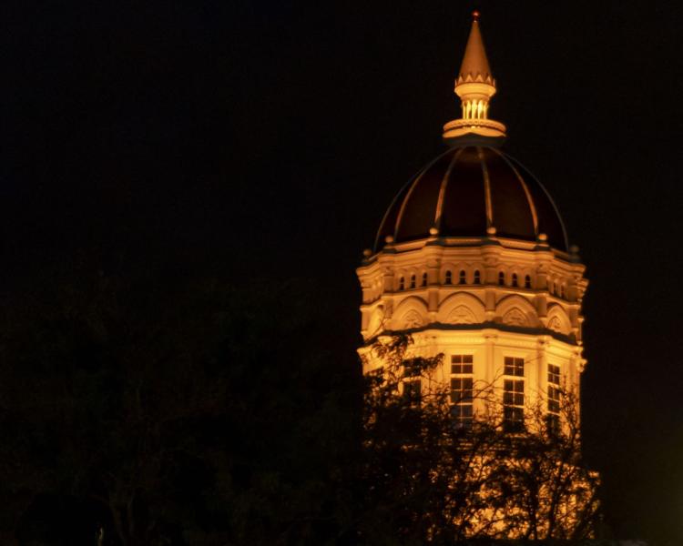 Jesse Hall dome lit gold