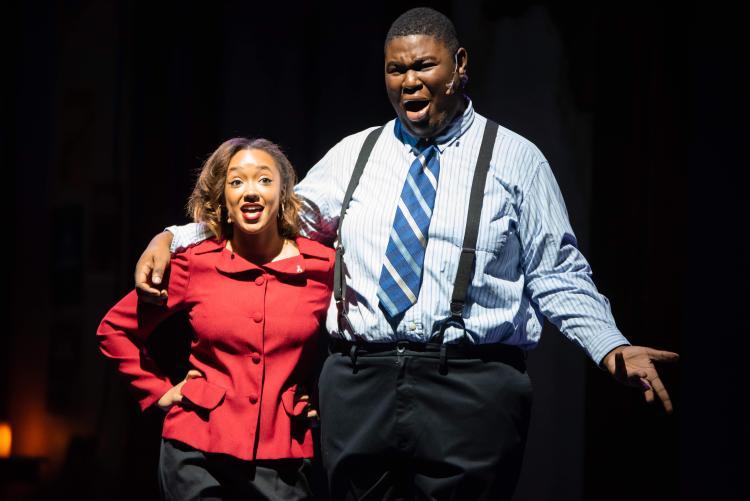 A photo of theatre students performing