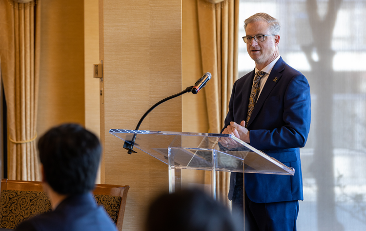 Cooper Drury at podium
