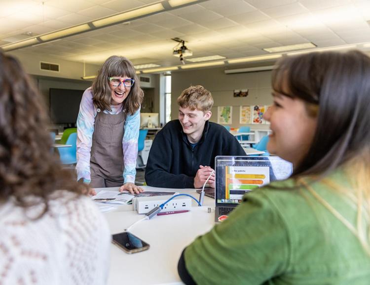 A photo of Students in the School of Visual Studies with their professor